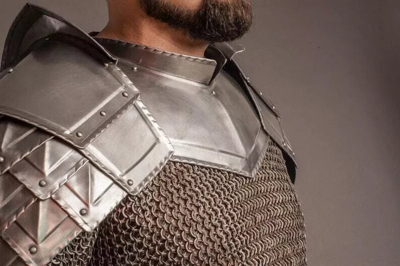 Adjustable leather straps on Dwalin's medieval pauldrons and gorget for a secure fit.