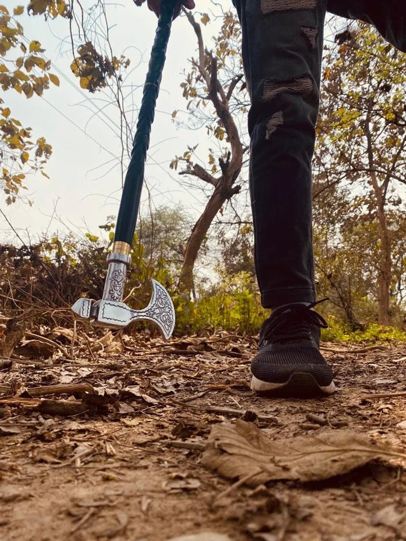 Vintage walking cane with axe-shaped head and 38-inch wooden shaft made from high-quality Indian rosewood, perfect for collectors