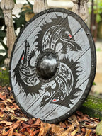 Action shot of the 24-inch wooden Viking shield in use during medieval combat. Designed for battle-readiness and providing strong defense.