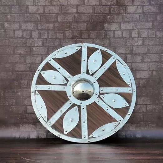 Battle-worn 24-inch handmade Viking shield crafted from wood and iron, perfect for cosplay and historical reenactments.