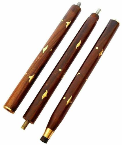 Close-up of black wooden shaft and designer brass handle of the vintage nautical walking stick, showcasing fine craftsmanship.