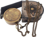 Brass compass engraved with Thoreau's "Go Confidently" quote, complete with stamped leather case.