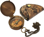 Antique brass compass displayed with real cowhide leather case and stamped compass rose design.