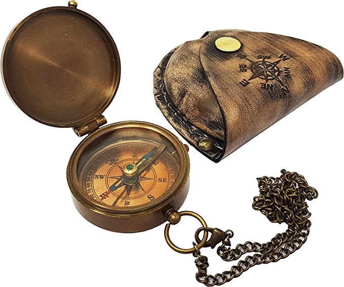 Antique brass compass displayed with real cowhide leather case and stamped compass rose design.