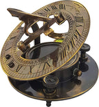 Side view of a brass sundial compass with intricate detailing and antique finish.