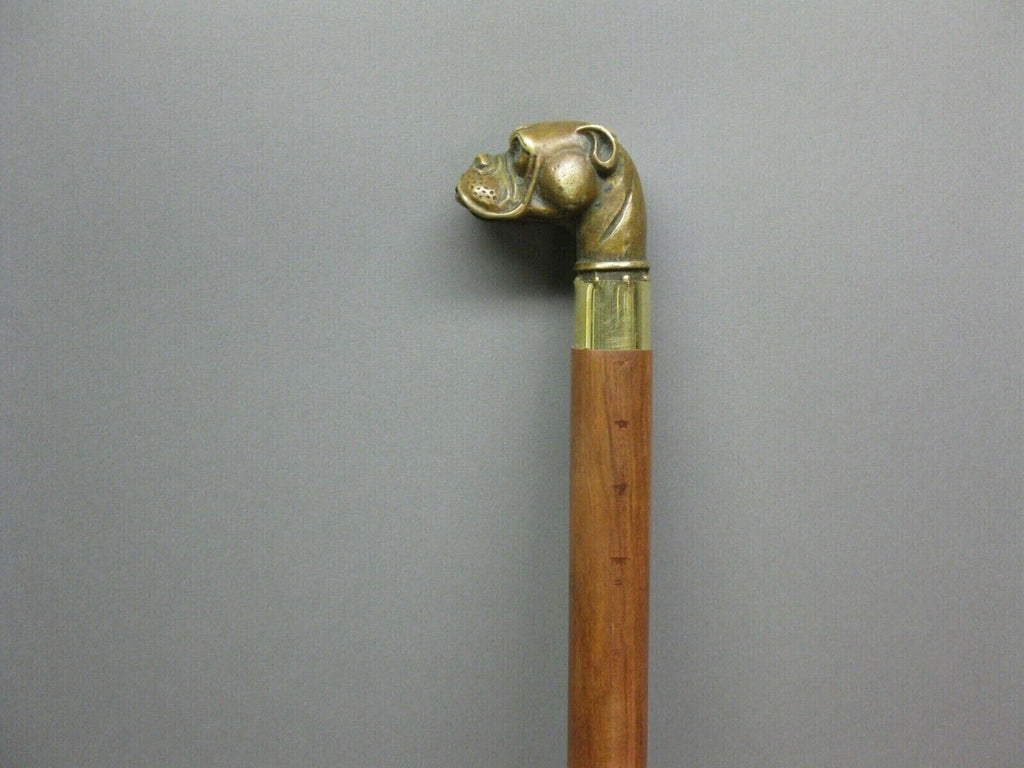 Classic Victorian walking stick cane with solid brass handle and engraved detailing, comfortable grip