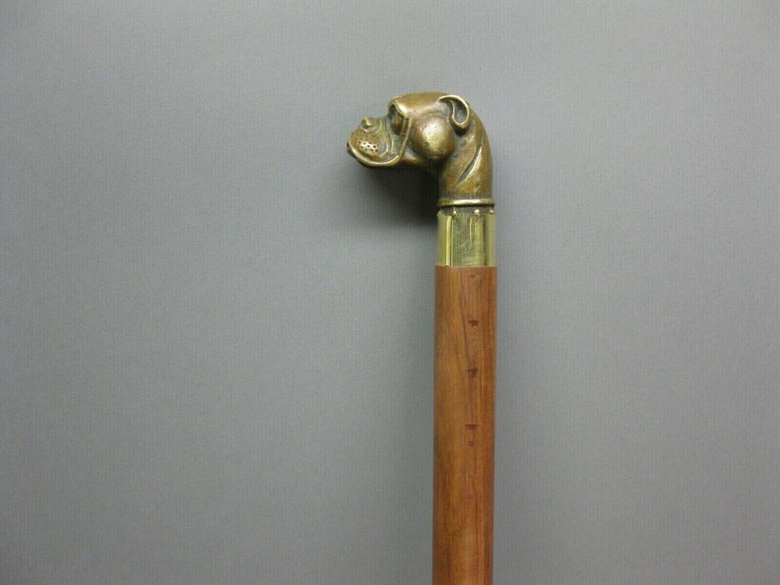 Classic Victorian walking stick cane with solid brass handle and engraved detailing, comfortable grip