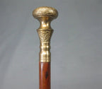 Close-up of Brass Handle on Antique Victorian Wooden Cane for Daily Use