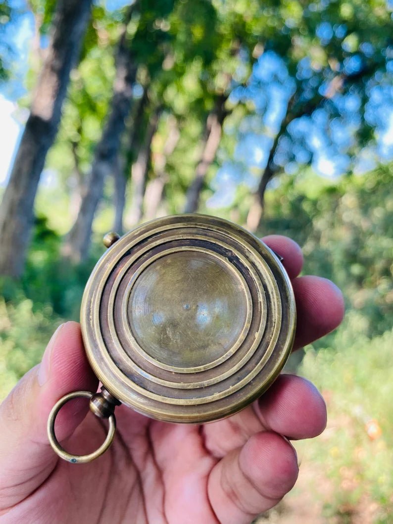 Nautical compass with a protective leather case, perfect for gifting