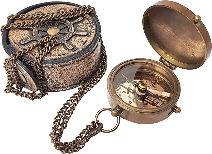 Close-up of the engraved Joshua 1:9 quote 'Be strong and courageous' on the brass compass, perfect for religious occasions