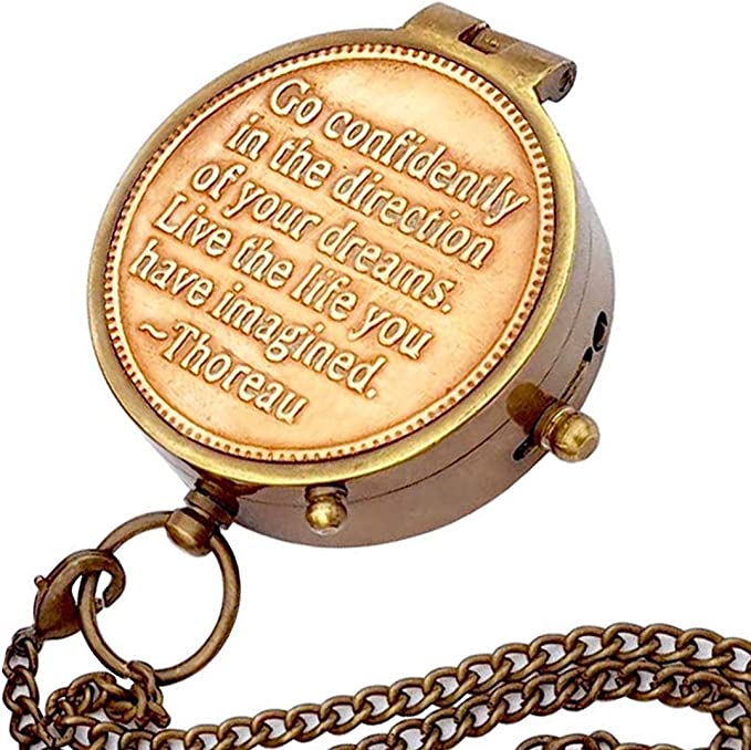 Thoreau's engraved brass compass presented as a graduation gift, ideal for adventure lovers.