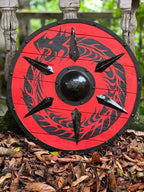 Handcrafted 24-inch Viking shield made of wood, perfect for medieval reenactments and display. Battle-ready craftsmanship for collectors.
