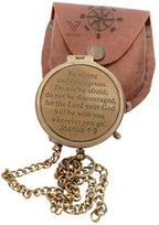 Detailed view of the handmade brass compass with vintage finish, highlighting its unique imperfections, perfect for religious gifts.