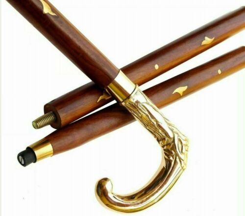 Handmade royal brass handle of the Victorian style walking stick with sleek black wooden shaft, perfect for elegant support.
