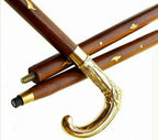 Handmade royal brass handle of the Victorian style walking stick with sleek black wooden shaft, perfect for elegant support.
