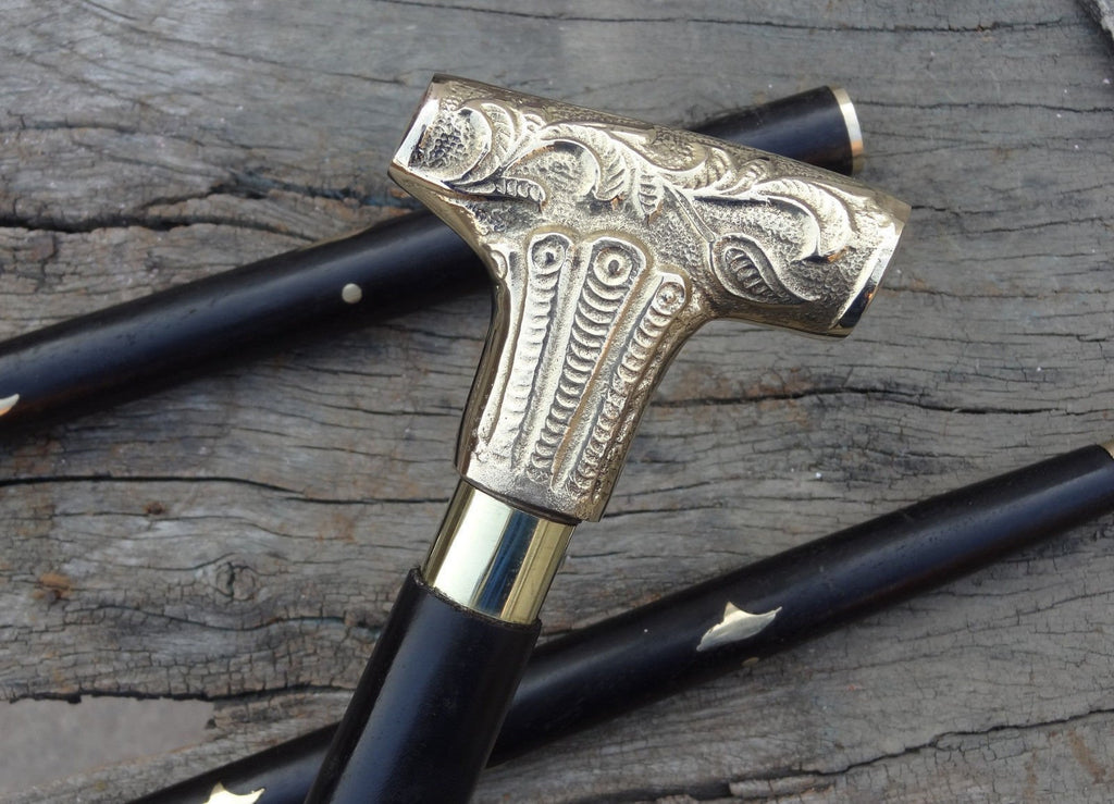 Handmade wooden walking stick, crafted by skilled artisans in India, highlighting fine craftsmanship.