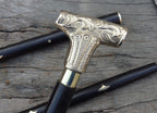 Handmade wooden walking stick, crafted by skilled artisans in India, highlighting fine craftsmanship.