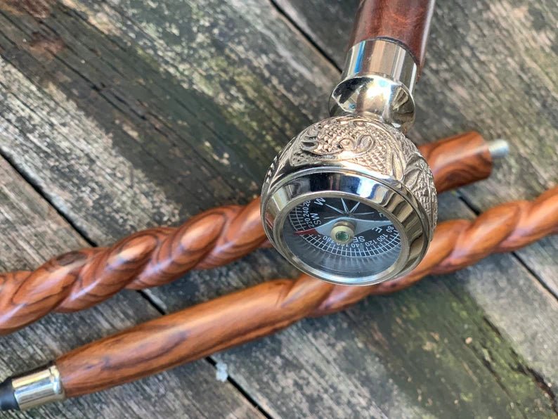 Hardwood shaft with solid brass compass handle on a Royal Engineers walking cane, weighing 600 g.