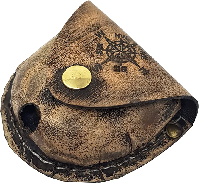 Back view of brass compass inside durable leather case, highlighting the compass rose stamp.