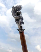 Close-up of the handle of the OCTOPUS Wooden Cane Victorian Style Walking Stick, highlighting its craftsmanship and vintage design.