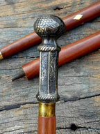 Shiny silver brass finish walking cane with wooden shaft, ideal for seniors and collectors