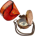 Close-up of Thoreau's quote "Go Confidently in the Direction of Your Dreams" engraved on the brass compass.