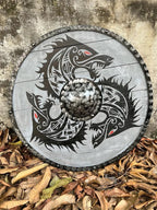 Handmade Viking shield, a unique and thoughtful gift option for medieval enthusiasts and collectors, featuring authentic design and craftsmanship.