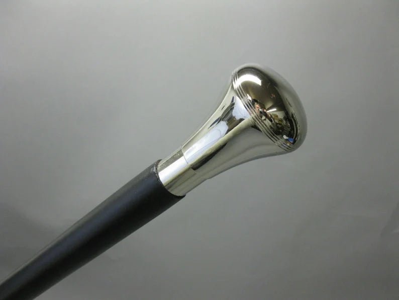 Front view of the Victorian Men Women Cane Walking Stick - Wooden, showcasing the elegant brass handle and smooth wooden shaft.