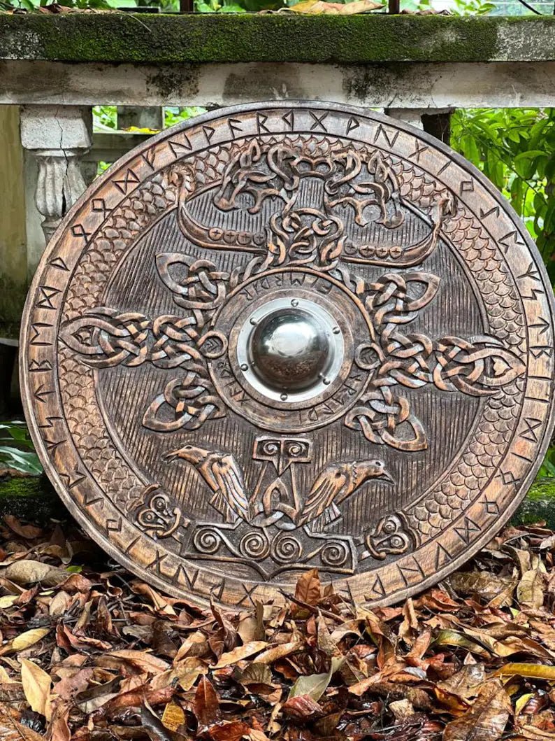 Collection of Viking Round Dragon Shields, showcasing various designs and sizes.