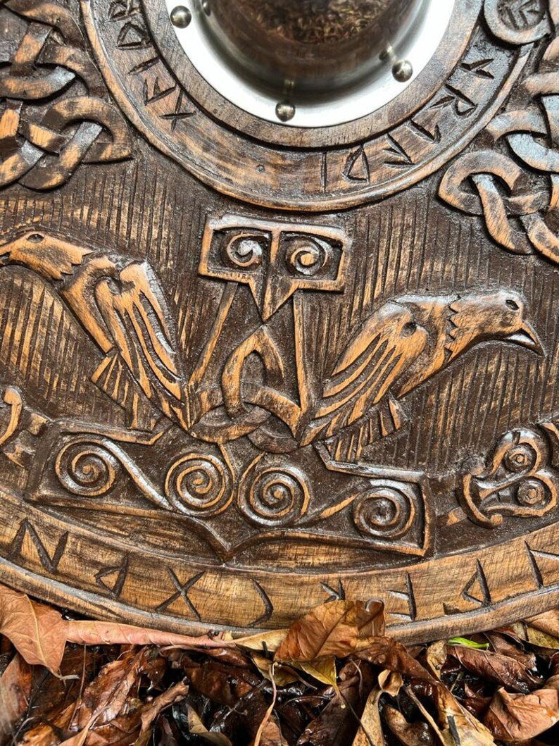 Viking Round Dragon Shield mounted on a wall, demonstrating its suitability as home decor