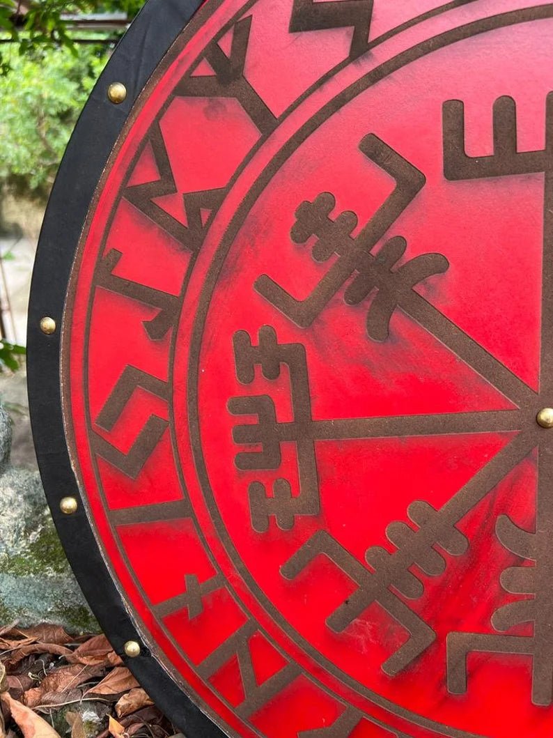 Viking shield ready for use in historical reenactments, showing wooden finish and sturdy design