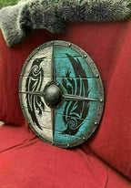 Round Viking shield crafted from wood and steel, ideal for home decor and historical enthusiasts