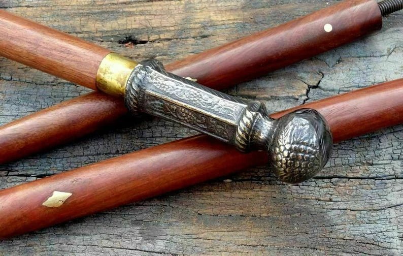 Vintage nautical style walking stick, 37 inches, featuring a pillar handle and brass finish.
