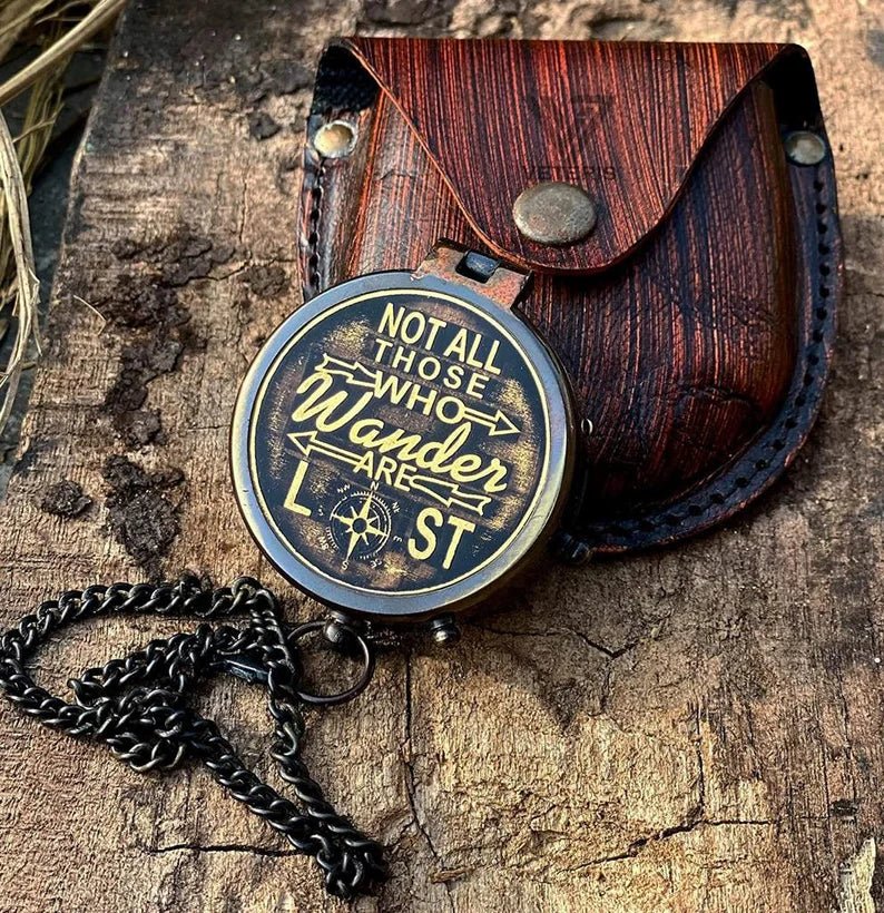Vintage style brass compass with an engraved motivational quote, a meaningful keepsake gift.