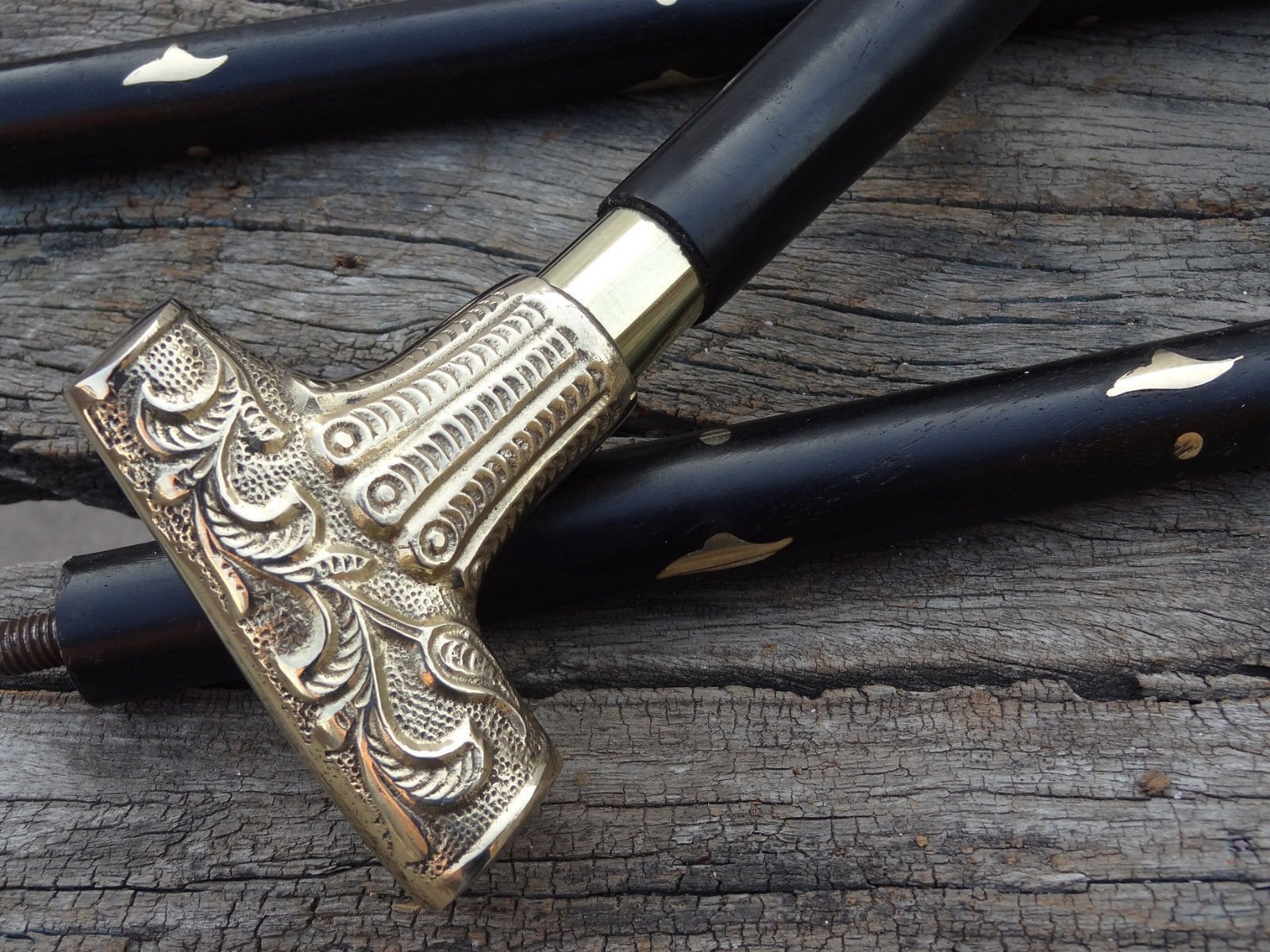 Wooden stick cane with 35-37 inch length and three wooden sections for easy customization.