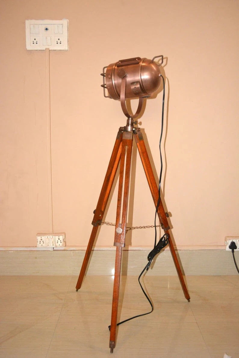 Hollywood designer floor light with black tripod stand antique spotlight