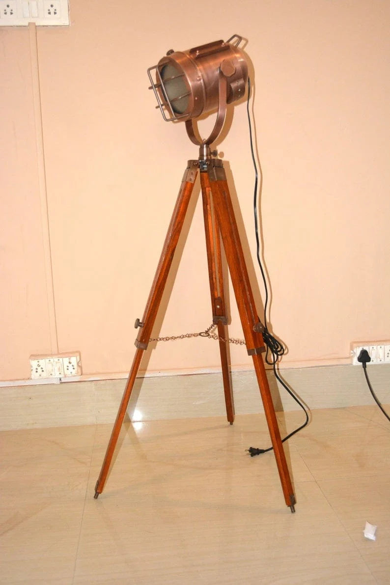 Hollywood designer floor light with black tripod stand antique spotlight