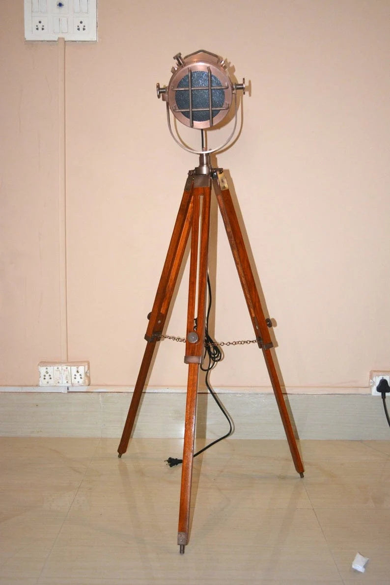 Hollywood designer floor light with black tripod stand antique spotlight